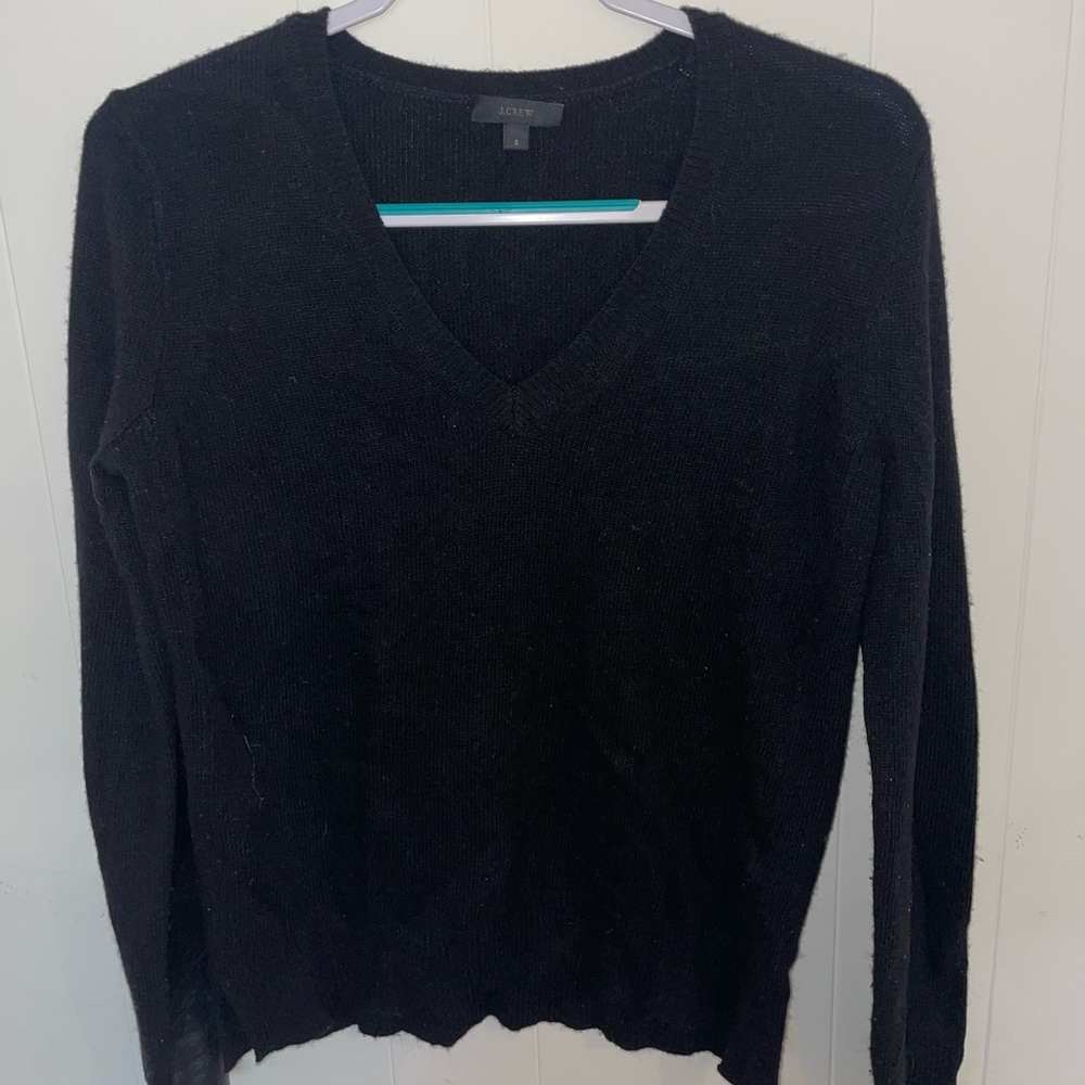 Black sweater with leather forearms